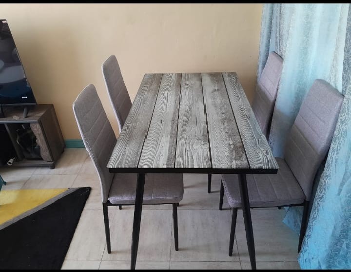 Rustic Grey 4-Seater Dining Set – Wood-Look Table & Fabric Chairs