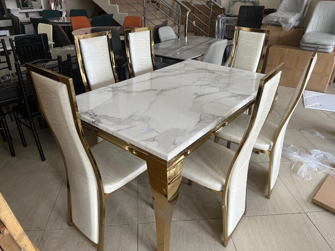White Marble-Look 6-Seater Dining Set – Gold Frame & Cream Chairs